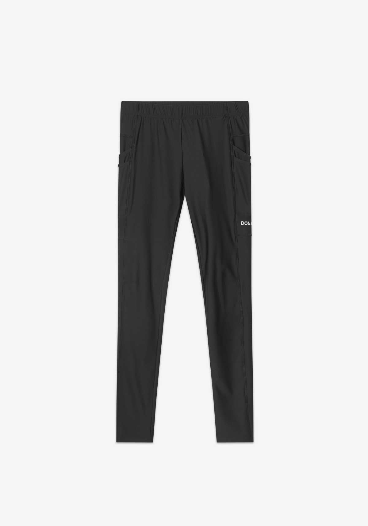 MNS RERUN TIGHTS 2.0 in black with reflective logo and dual side pockets.